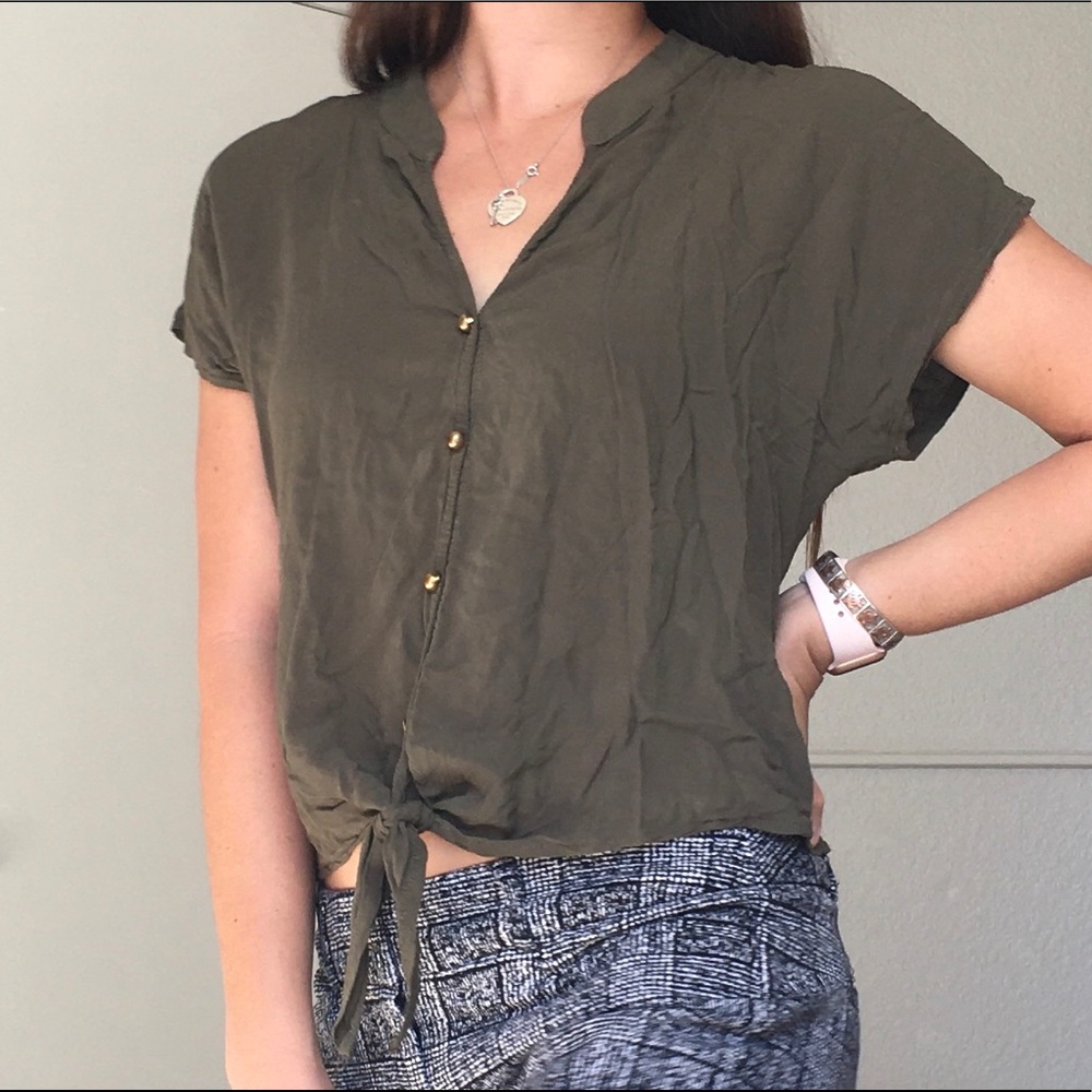 Green button up shirt
